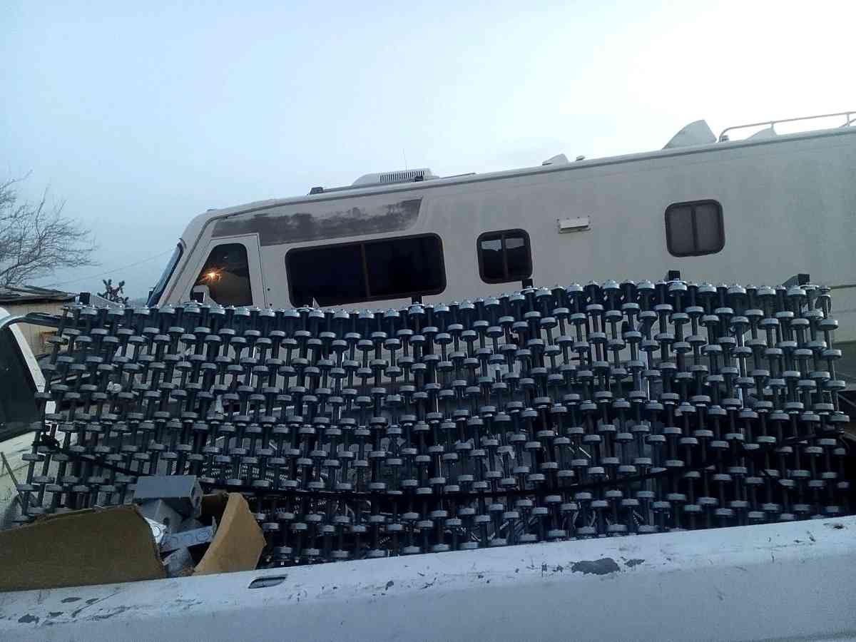 two roller carts to unload cargo from trucks