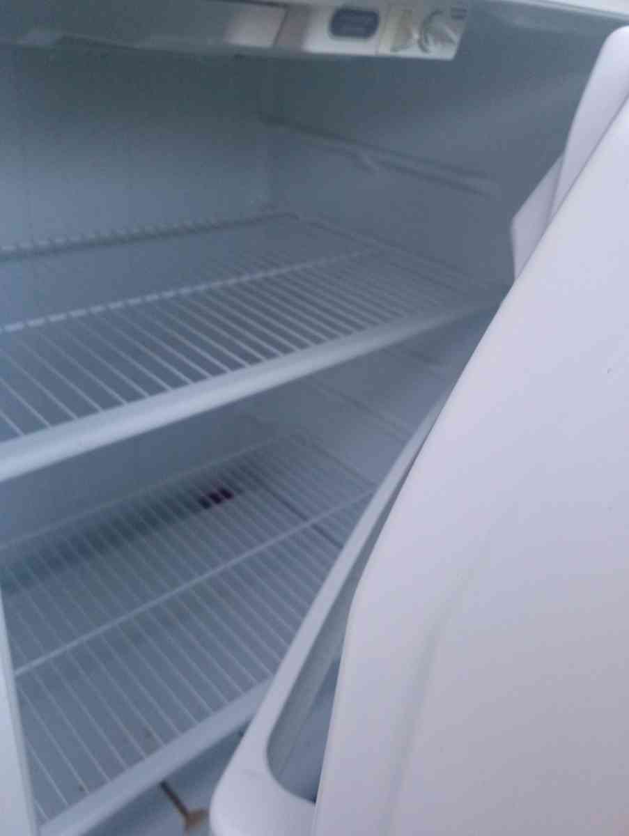 refrigerator and gently used electric stove