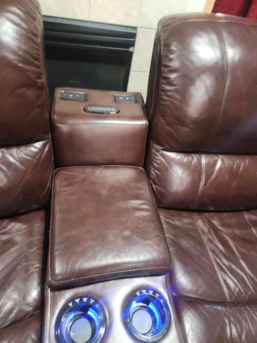Brown leather electric recliner loveseat