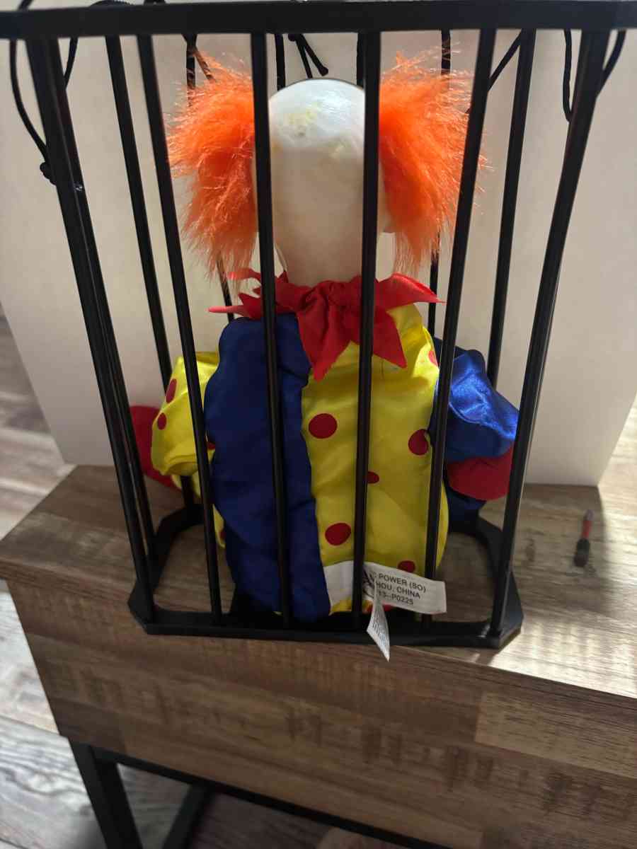 vintage Caged scary evil clown