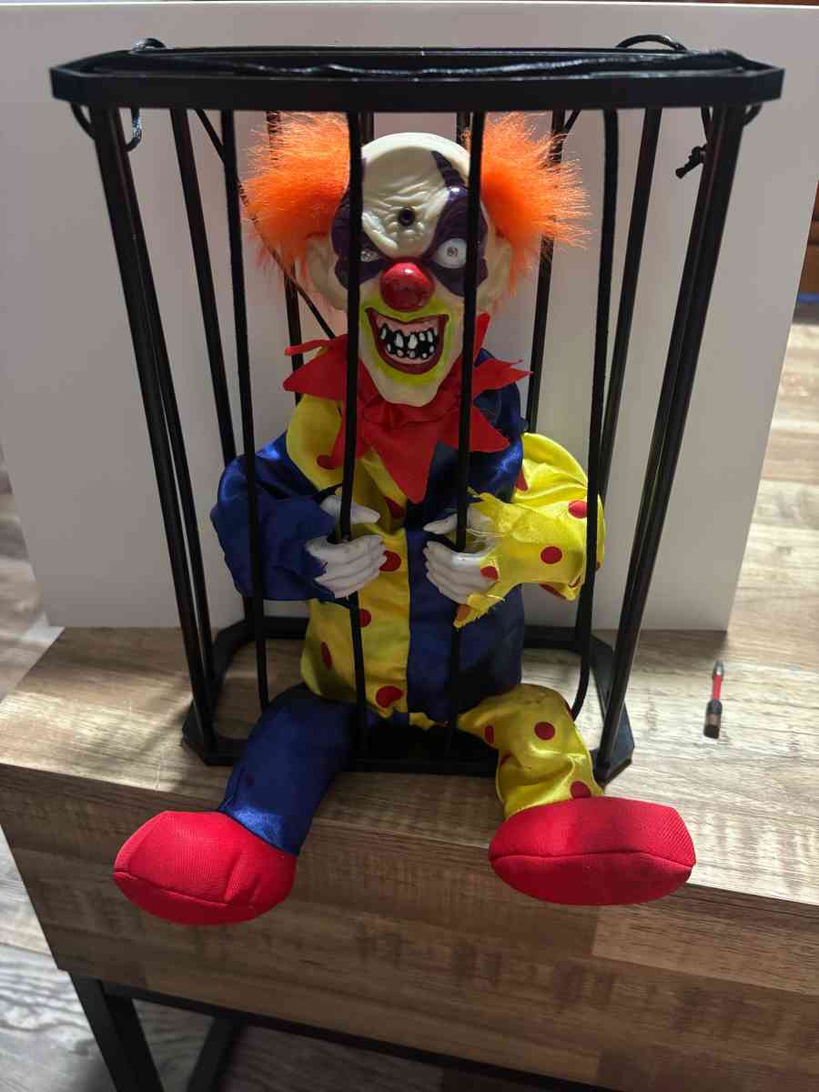 vintage Caged scary evil clown