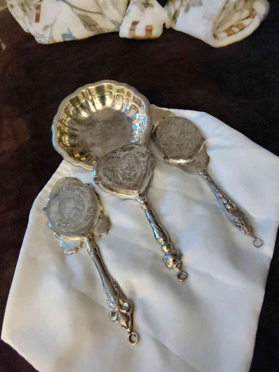 vintage handheld mirrors made by twos company and a bowl