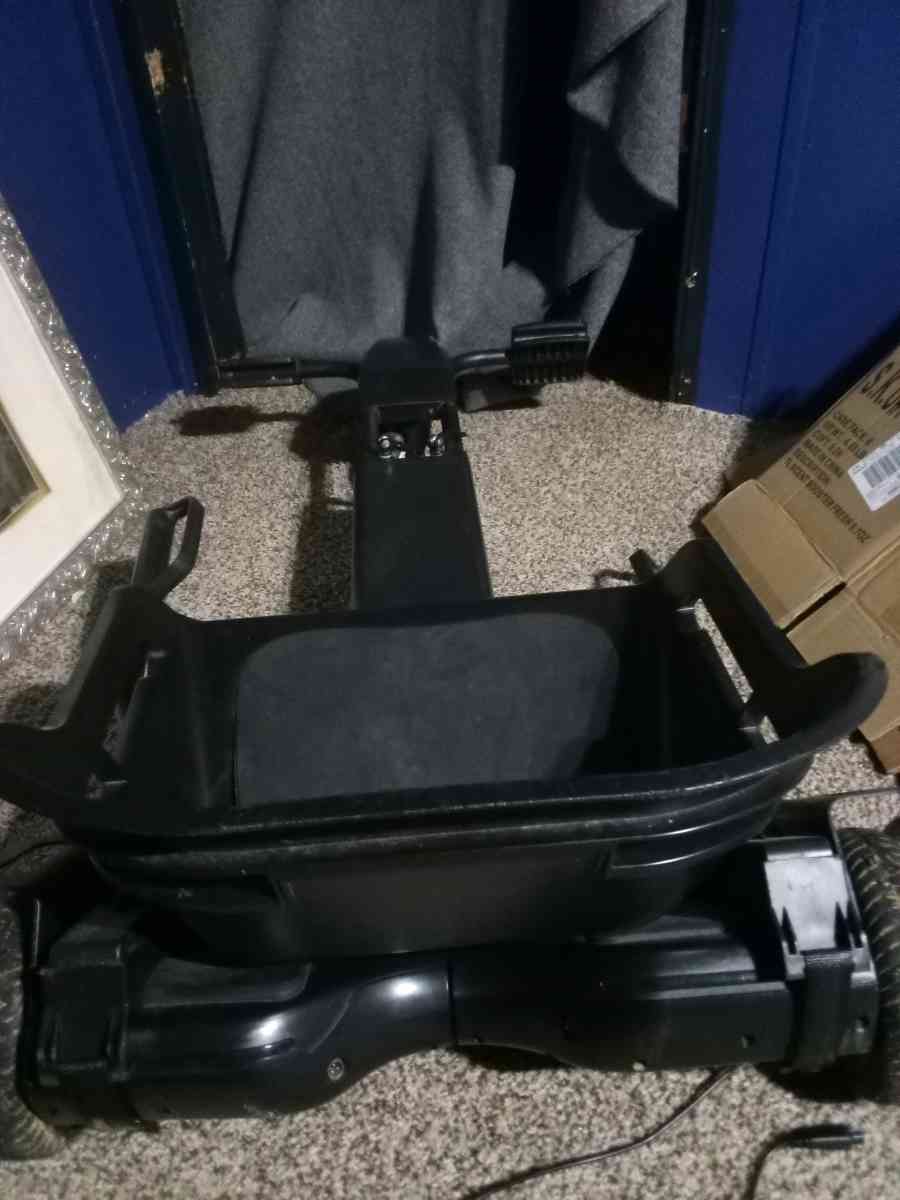 stand on and sit down skate board type thing