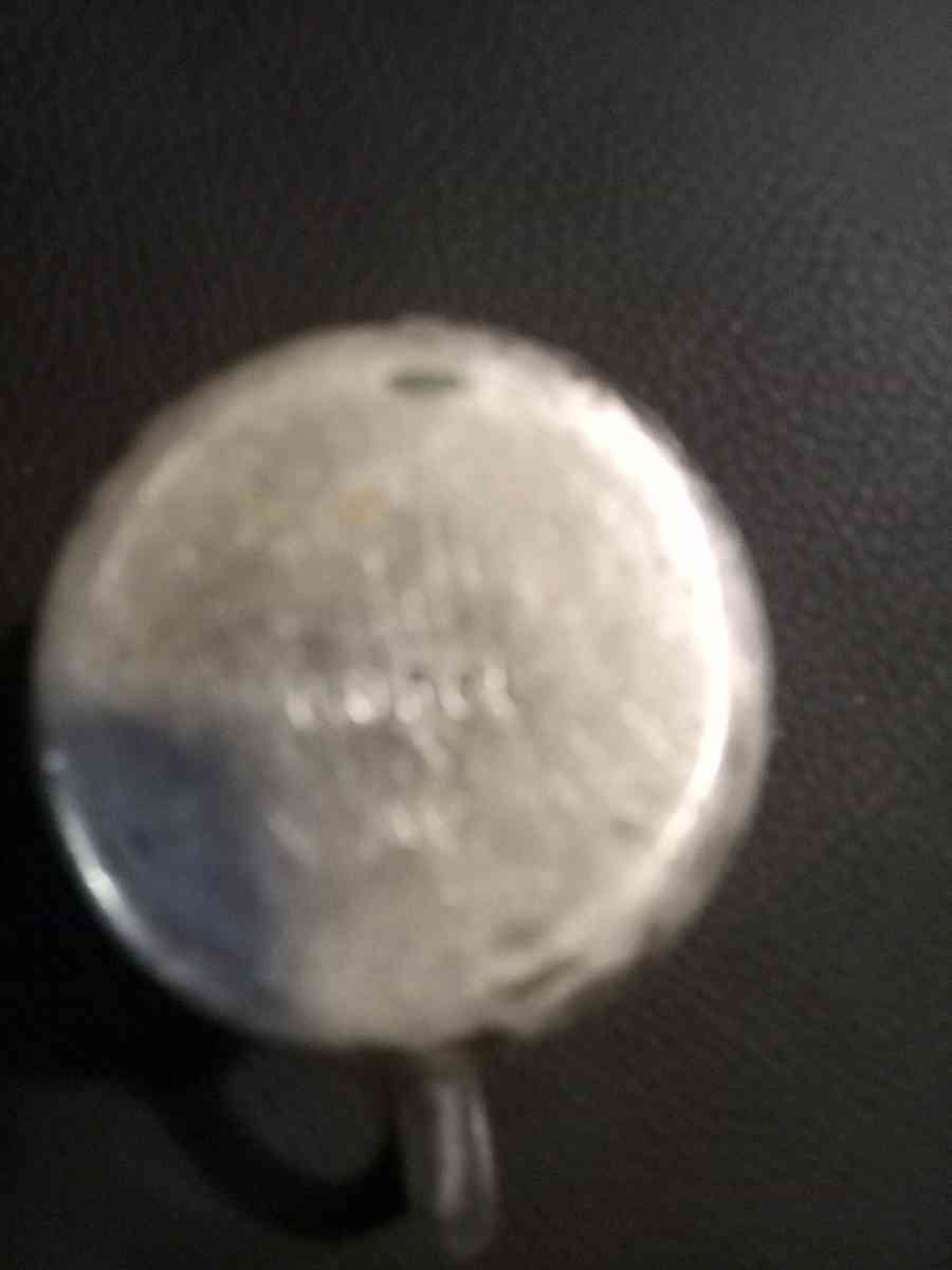 miniature silver water pitcher