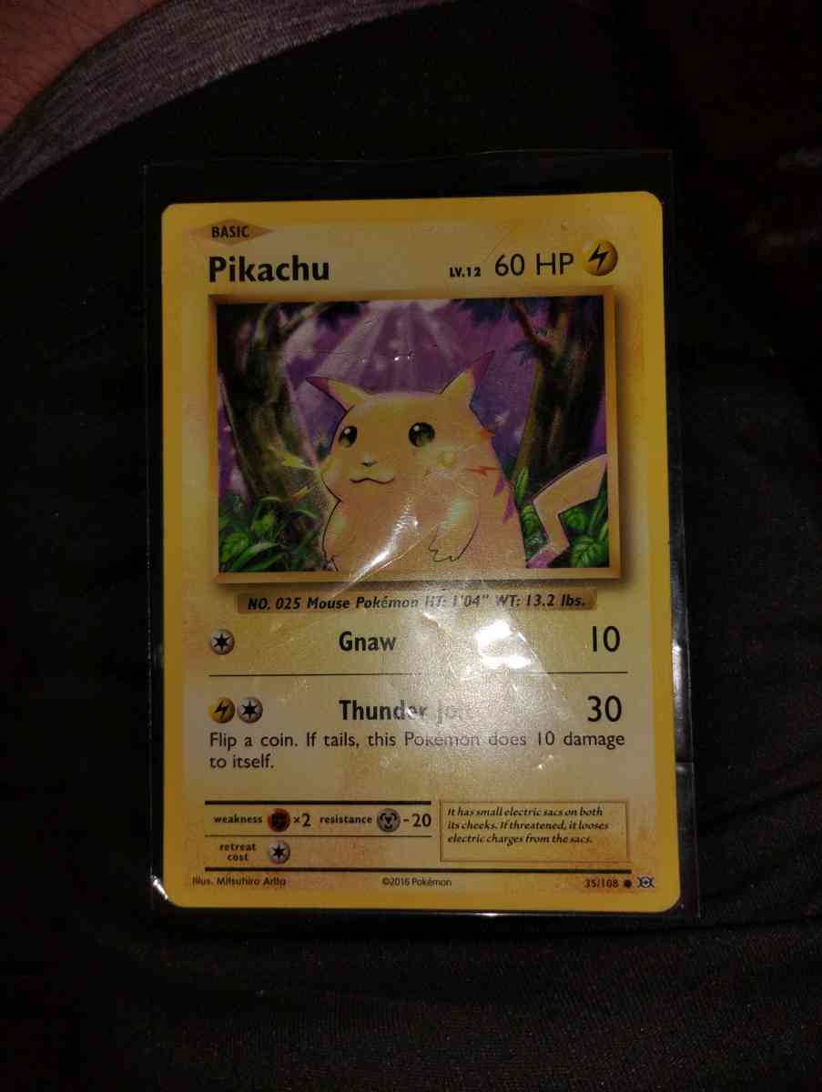 selling rare 2016 Pikachu and rare 2016 team rocket trainer