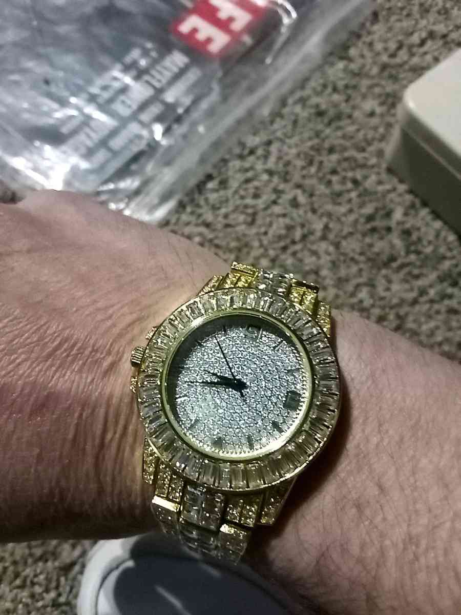 fake diamond and gold watch