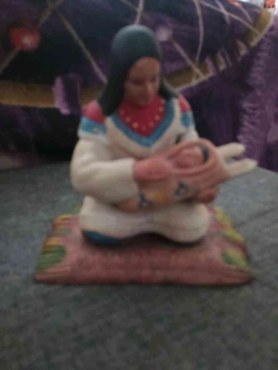 mother and baby Indian statue