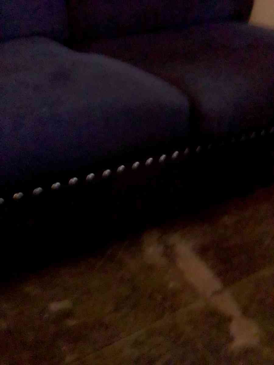 studded black contemporary couch