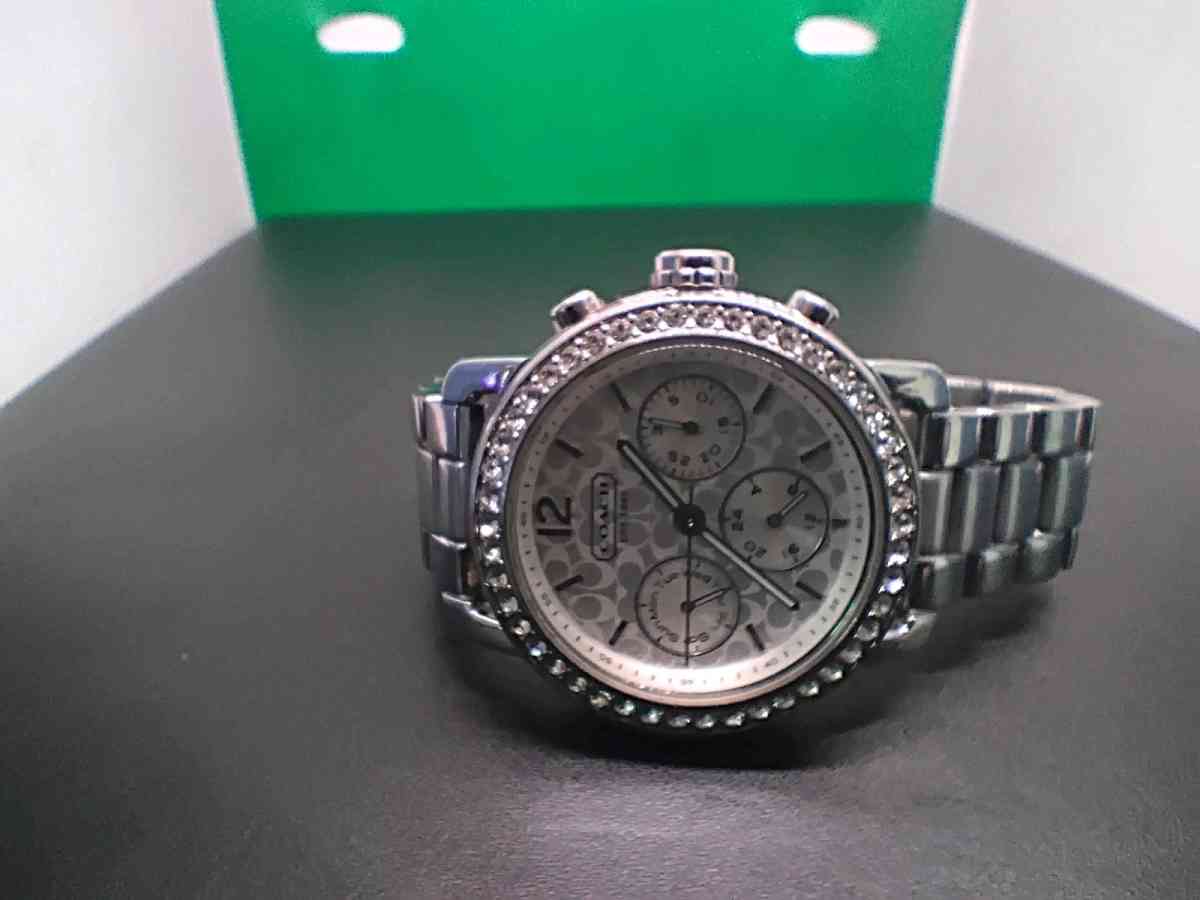 Womens Coach watch with diamonel