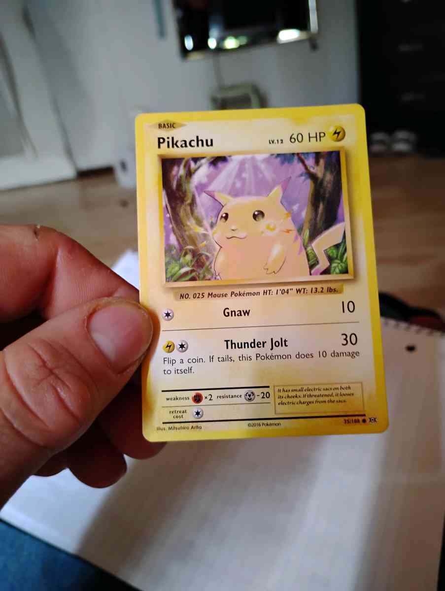 selling rare 2016 Pikachu and rare 2016 team rocket trainer