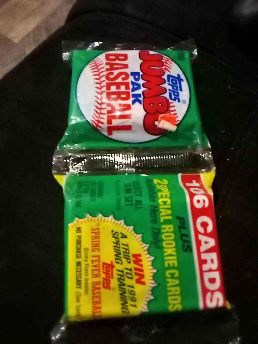 two sealed packs of 1990 Topps baseball cards