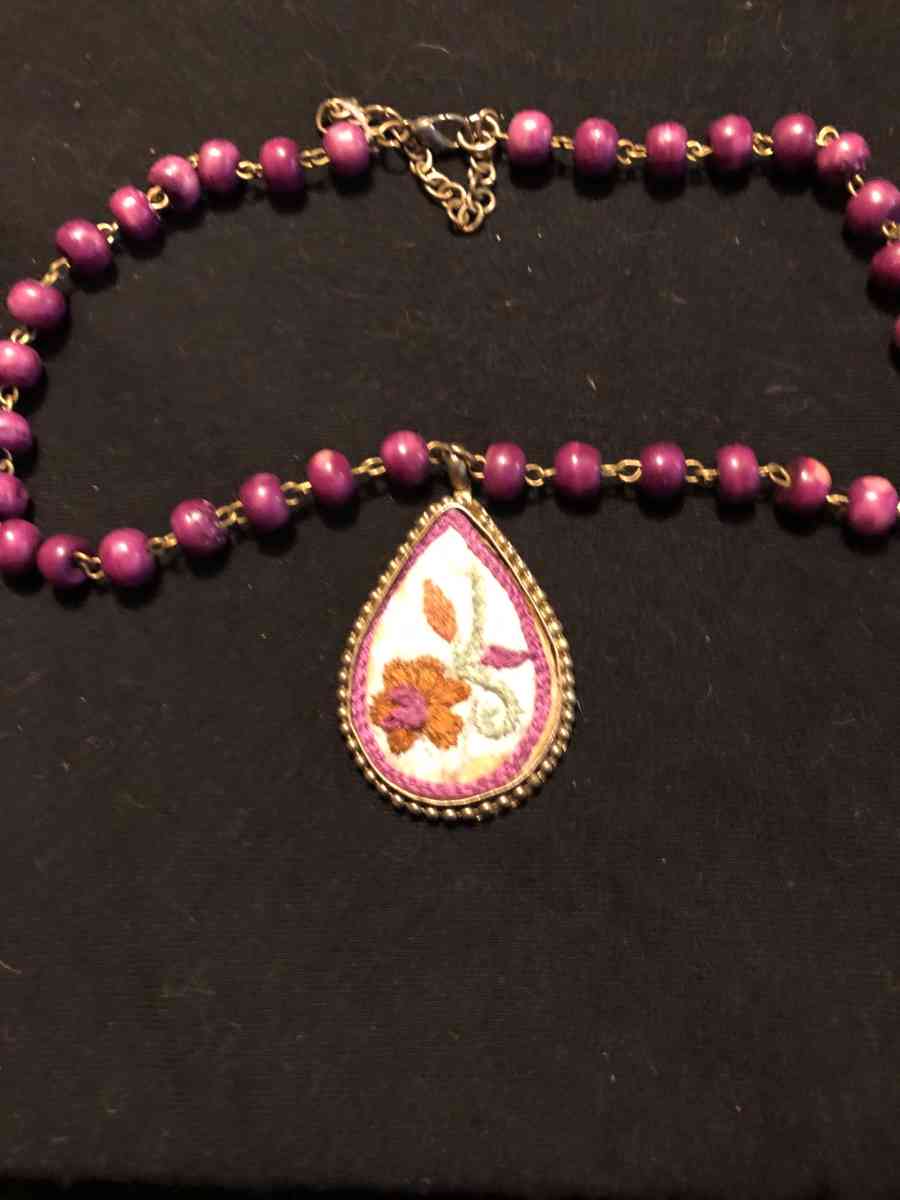 hand stitch necklace on a 20 inch chain vintage
