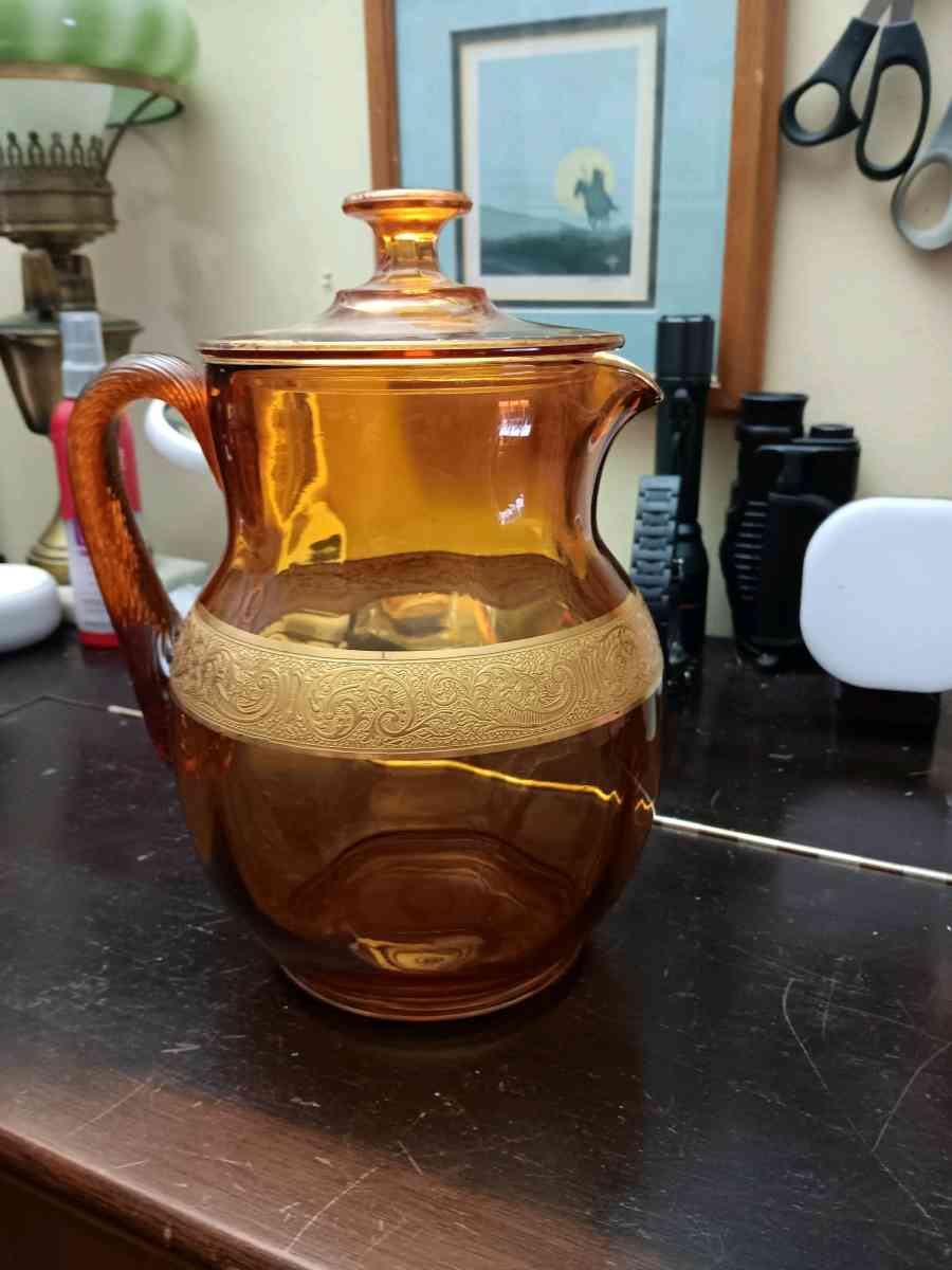 early Amber glass with gold leaf inlays picher