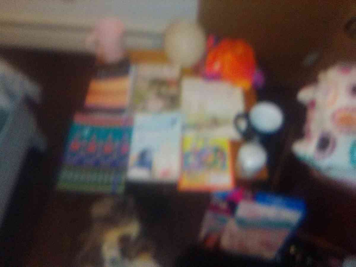 books clothes and blanket cups