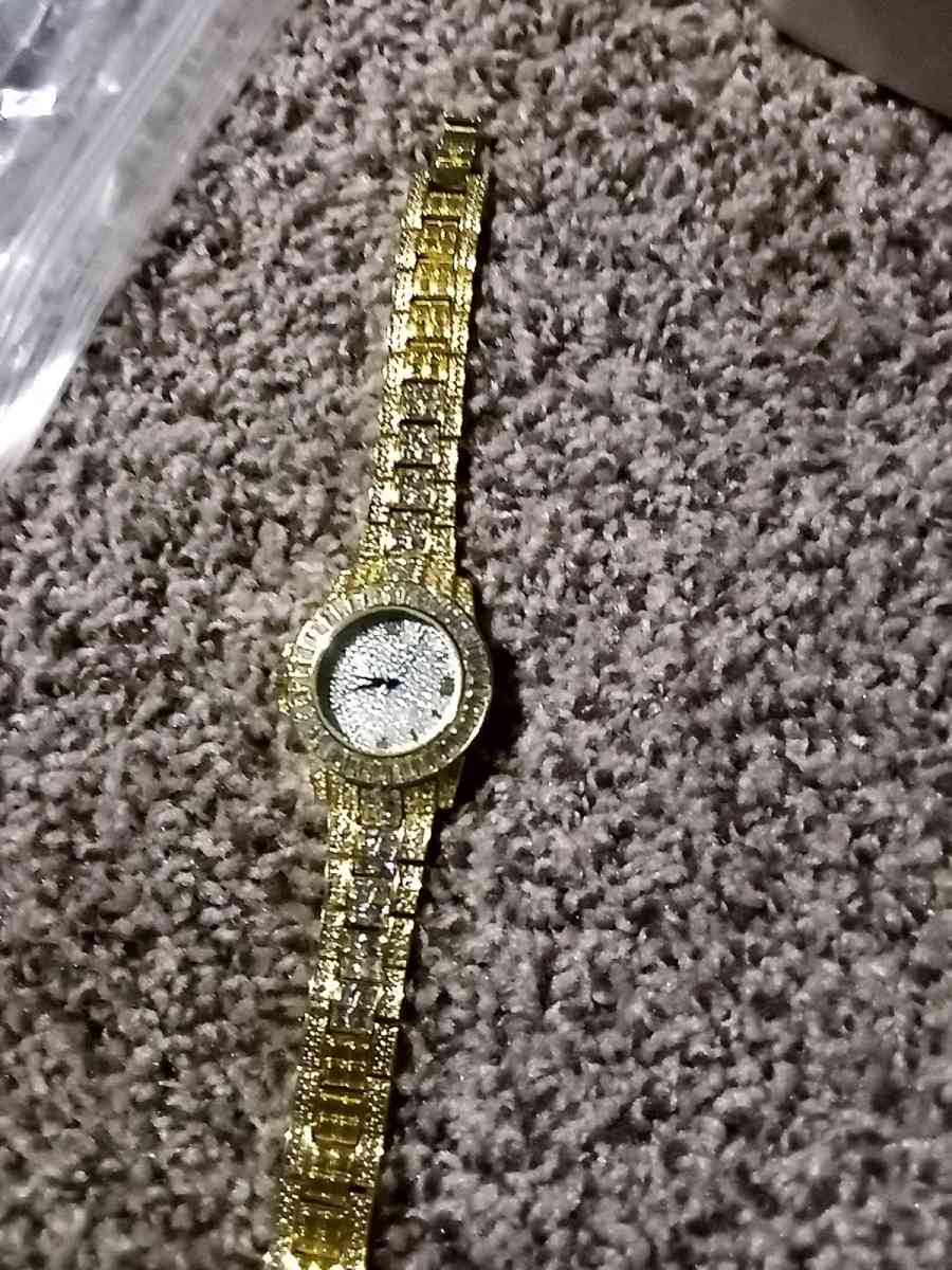 fake diamond and gold watch