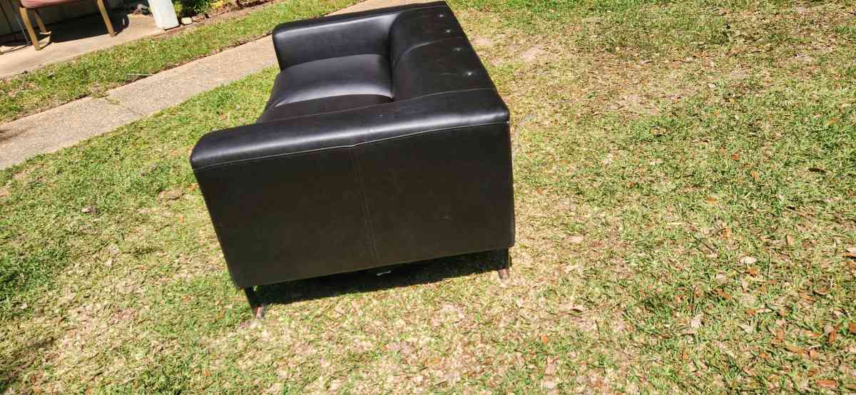 Black modern style leather couch very comfy cushions attache