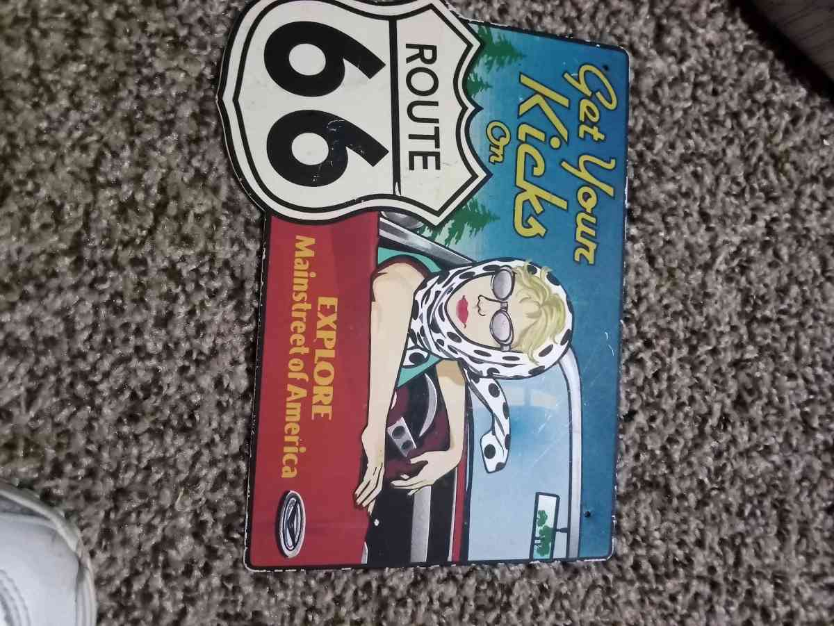 route 66 sign with woman