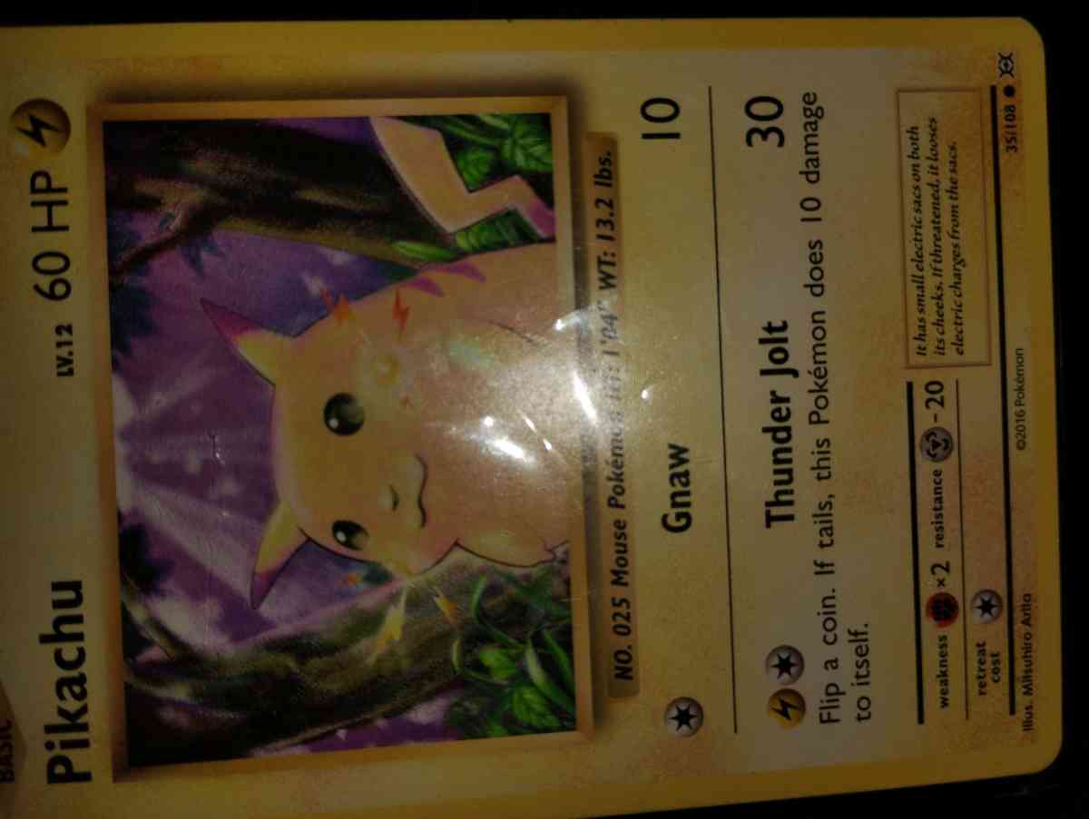 selling rare 2016 Pikachu and rare 2016 team rocket trainer
