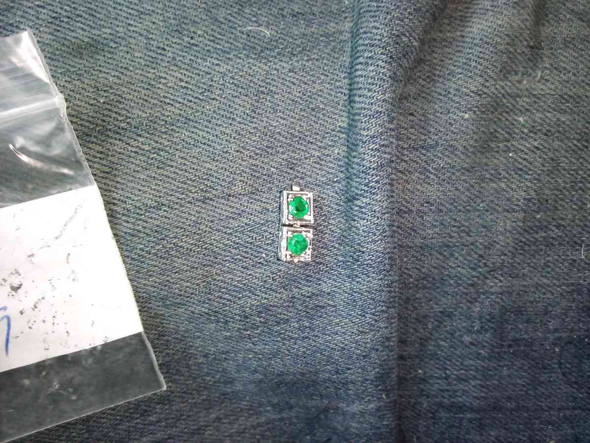Two half carat  Emeralds set in white Gold