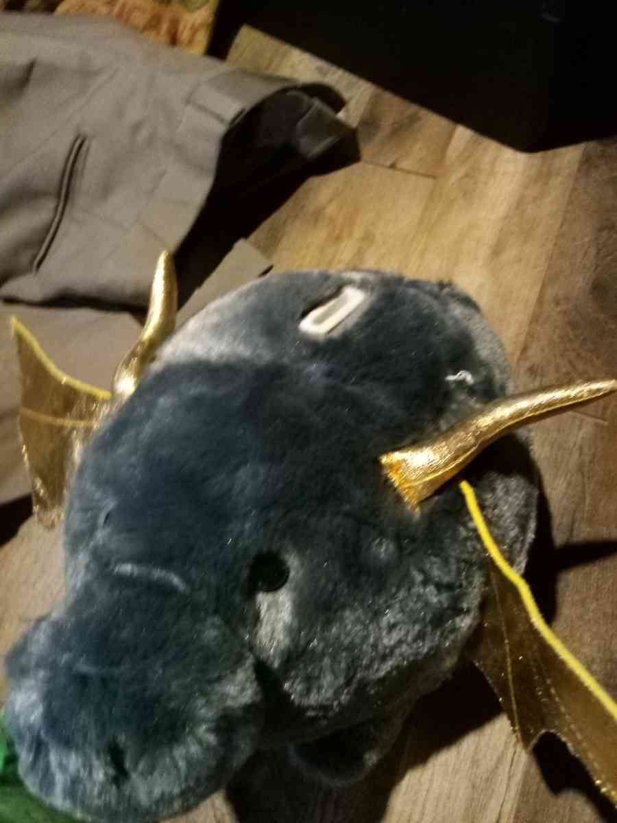 stuffed piggy bank with bat wings
