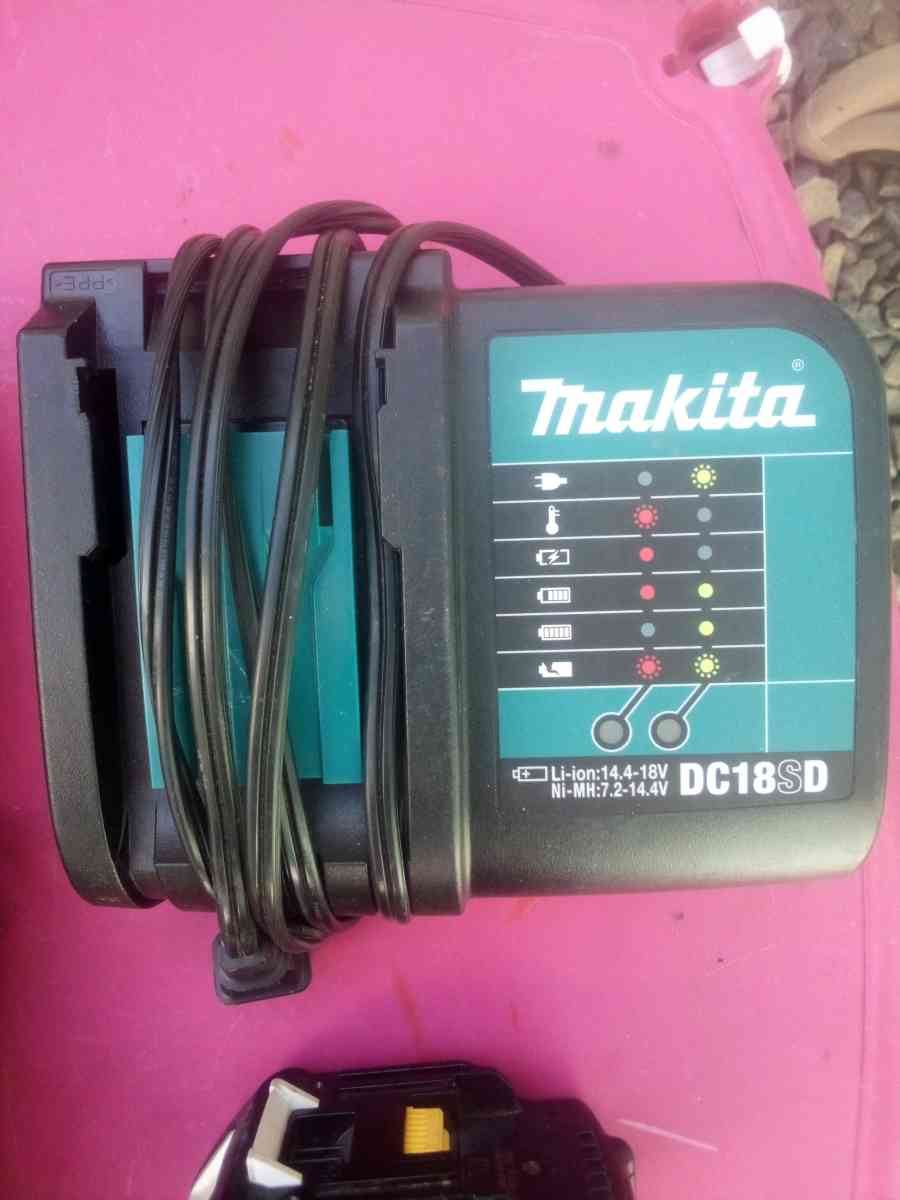 Makita chargers and 1 battery