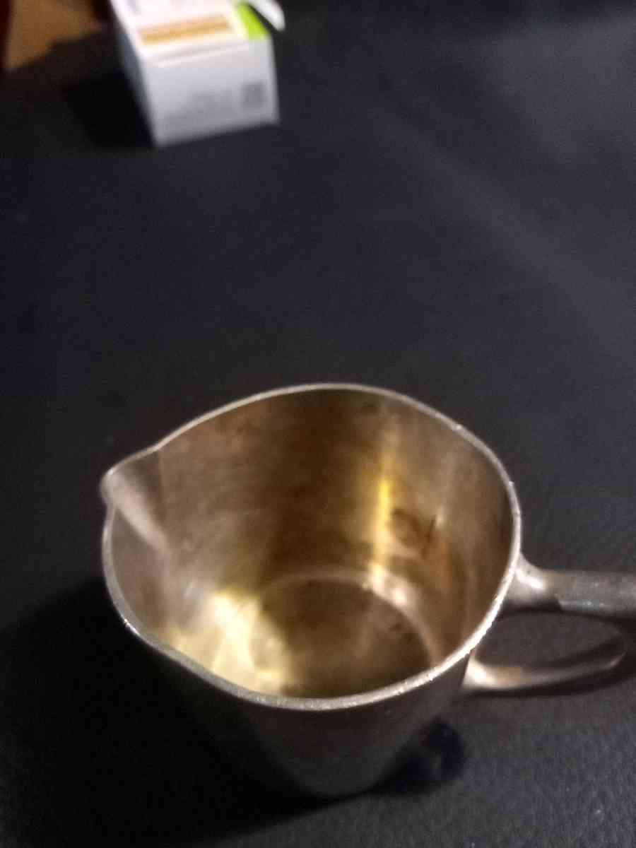 miniature silver water pitcher