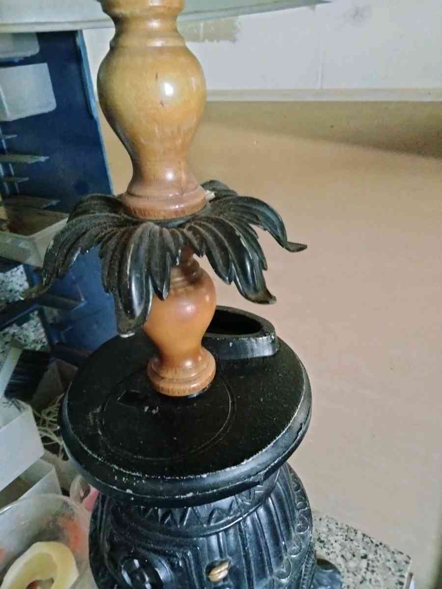 lamp with a pot belly stove base