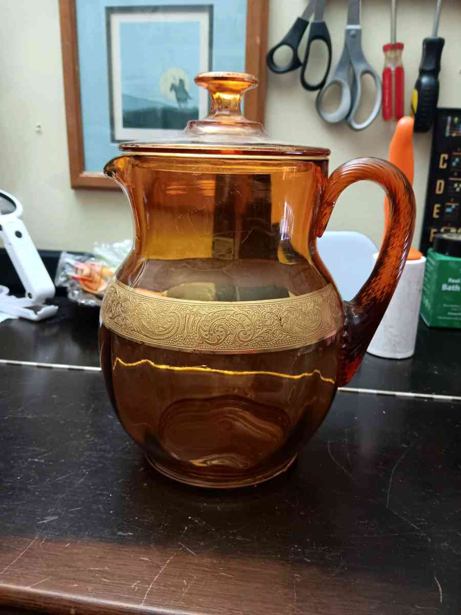 early Amber glass with gold leaf inlays picher