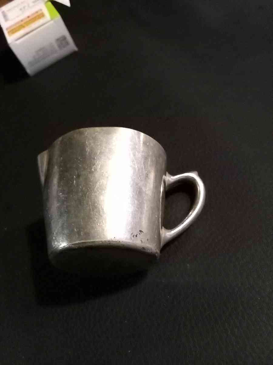 miniature silver water pitcher