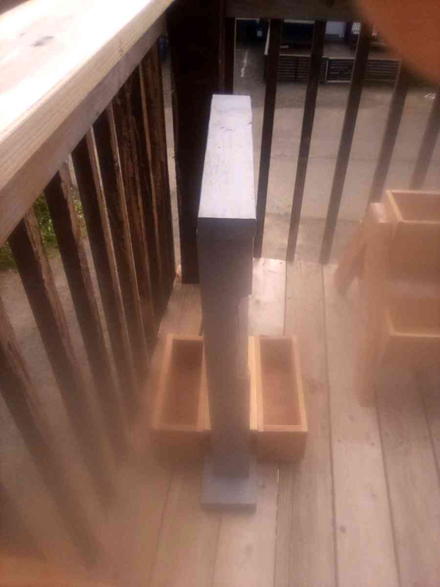 welcome sign with planters