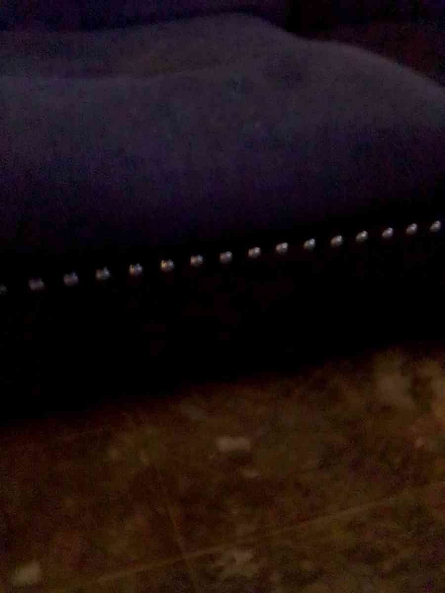 studded black contemporary couch