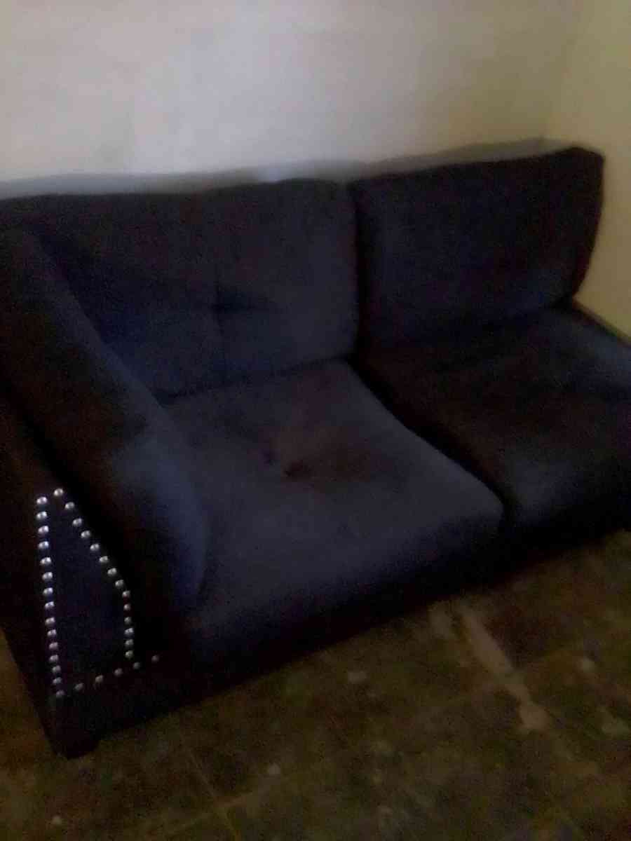 studded black contemporary couch