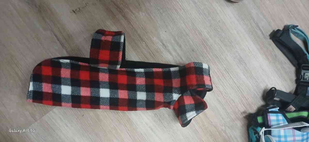 dog sweaters and rain coats size small to medium