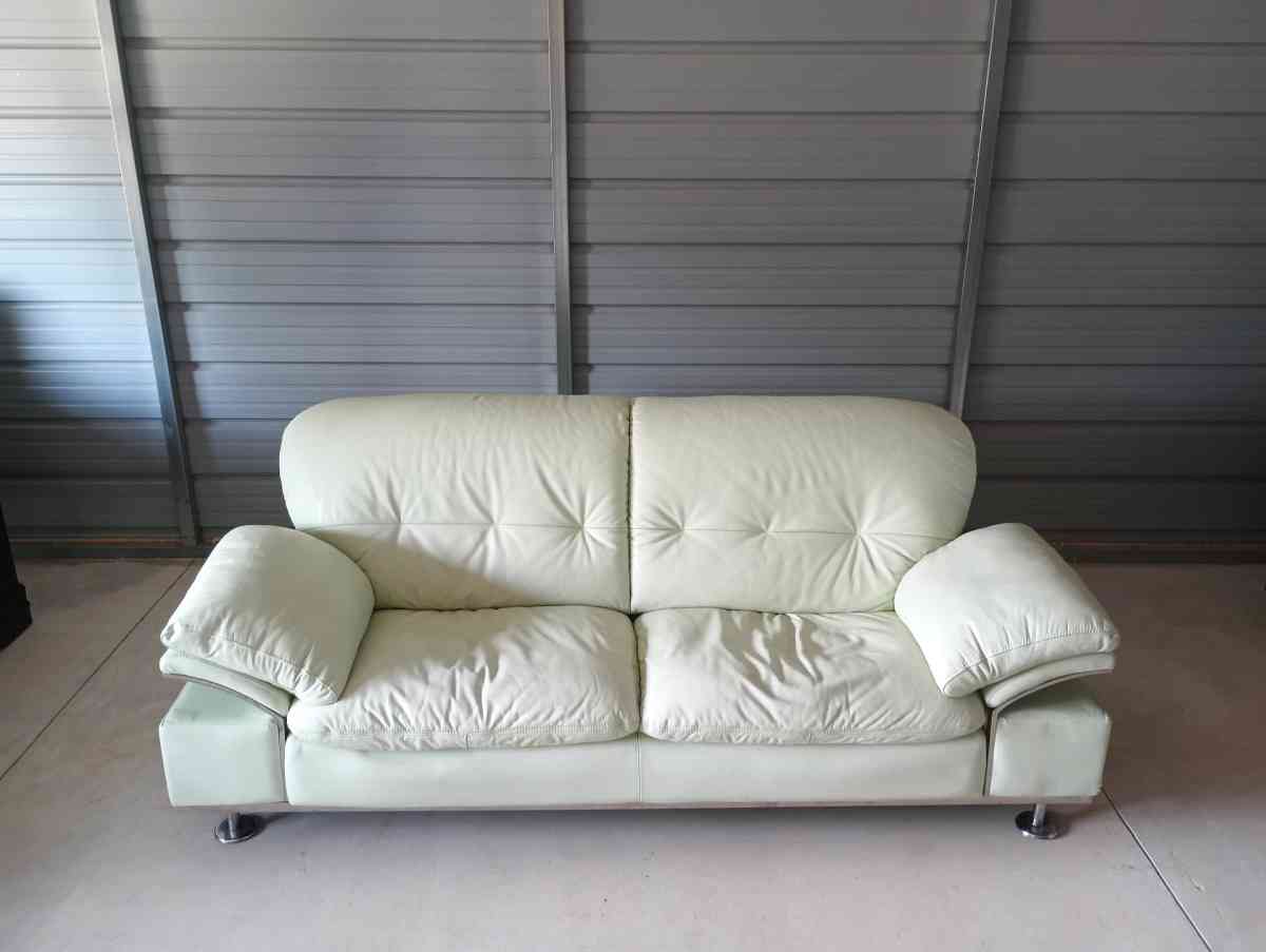 Celadon color Leather couch  FREE DELIVERY IF NEEDED
