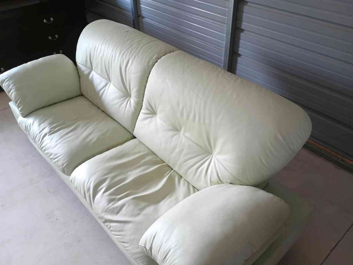Celadon color Leather couch  FREE DELIVERY IF NEEDED