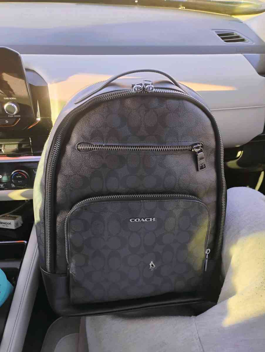 black leather Coach backpack