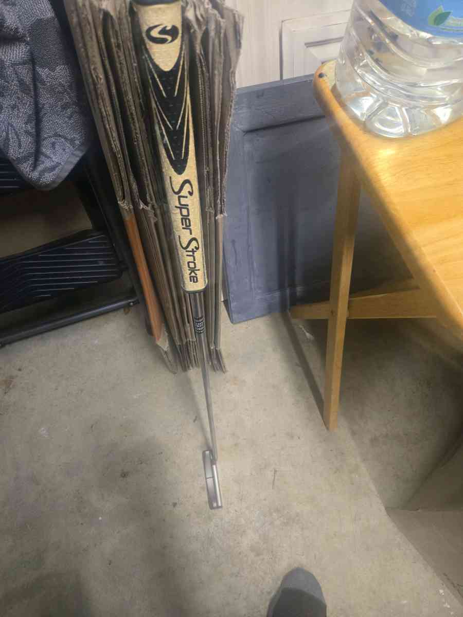 golf clubs and golf bag