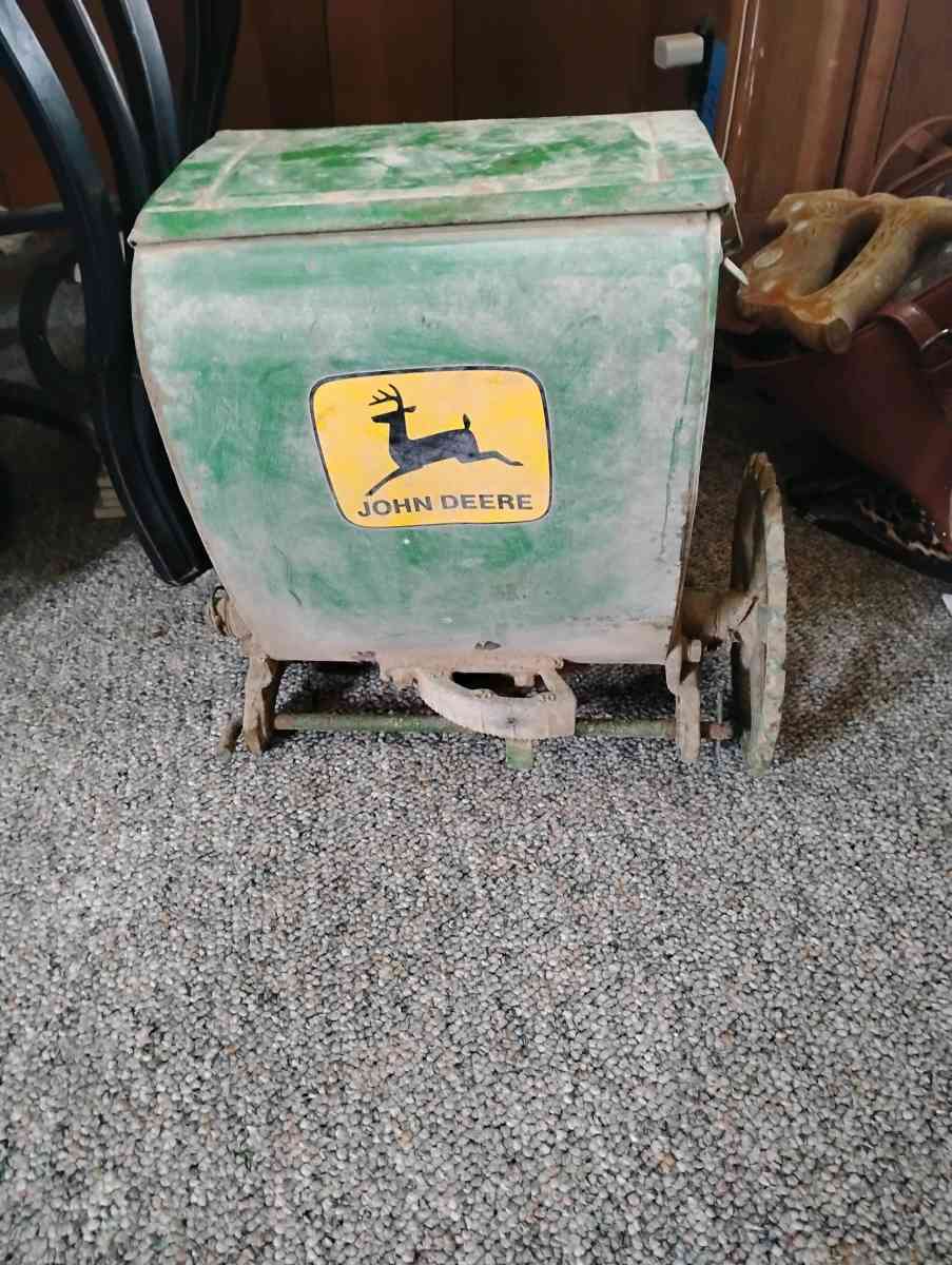 2 vintage John Deere planters