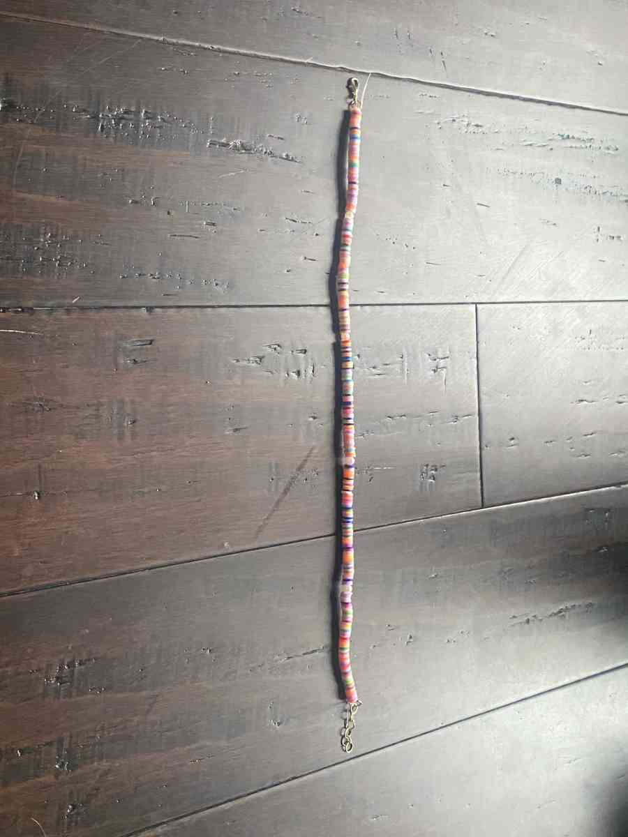 Beachy orangey necklace with pearls with different levels