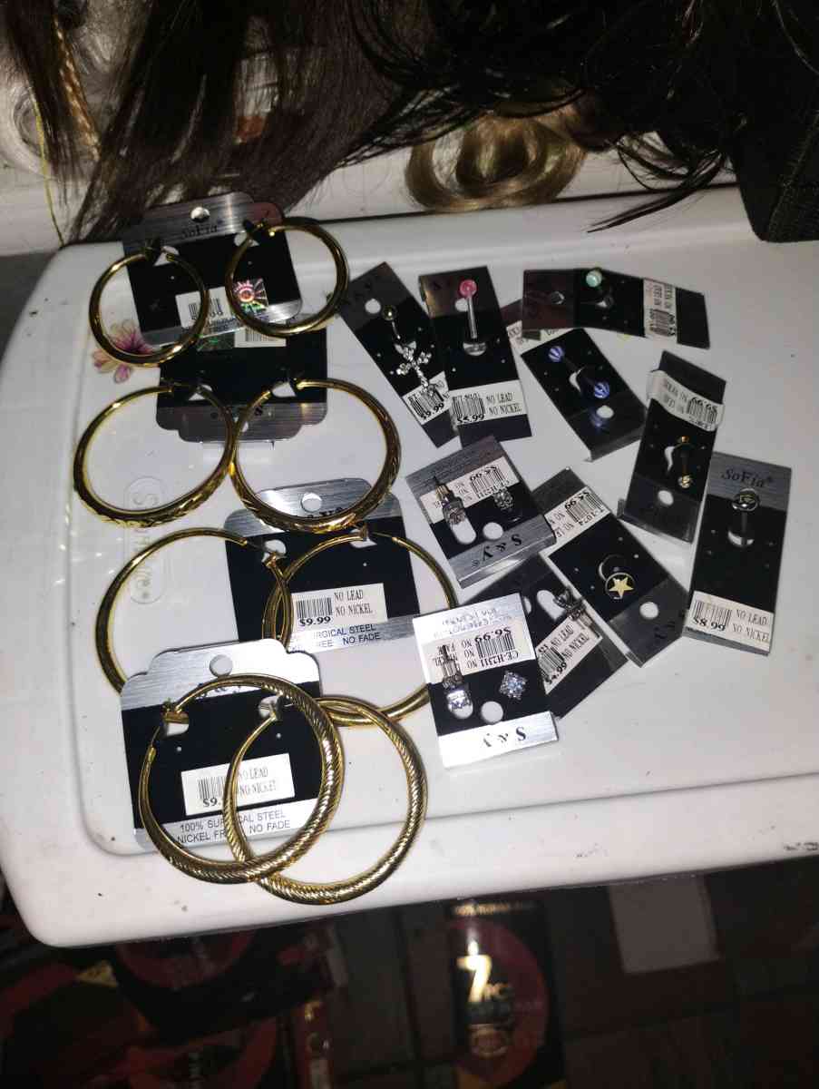 earrings tongue rings and belly button piercings