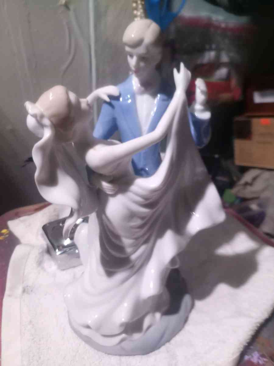 porcelain wedding figurine of man and woman