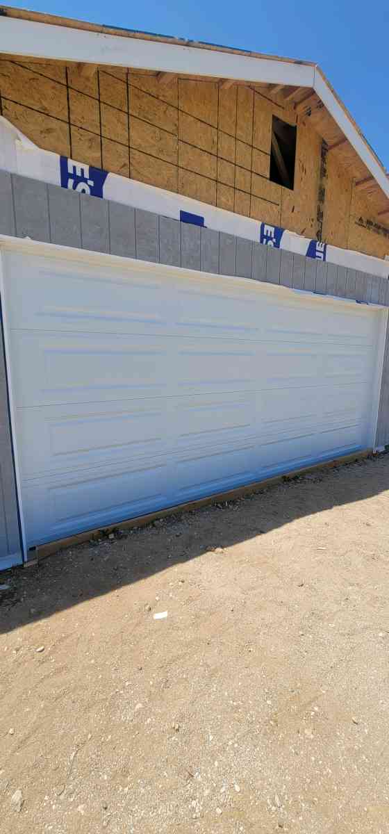 NEW GARAGE DOORS