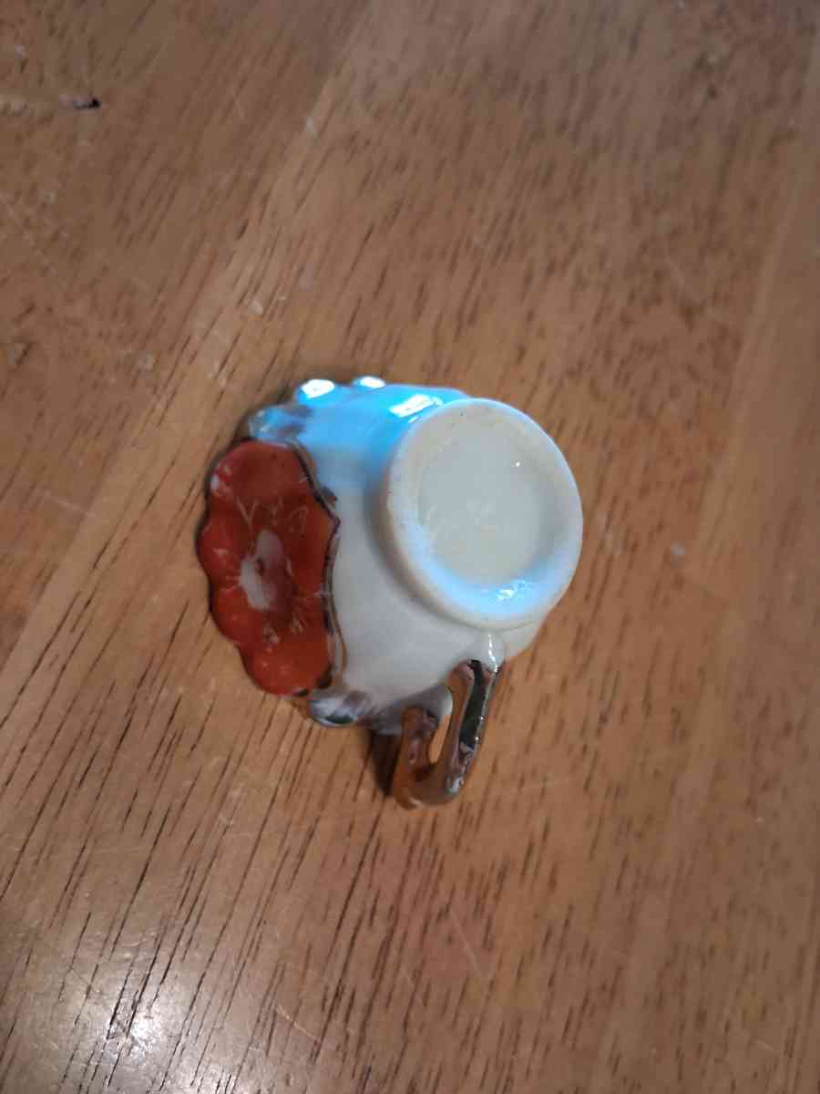 orange and pink flower design tiny teacup