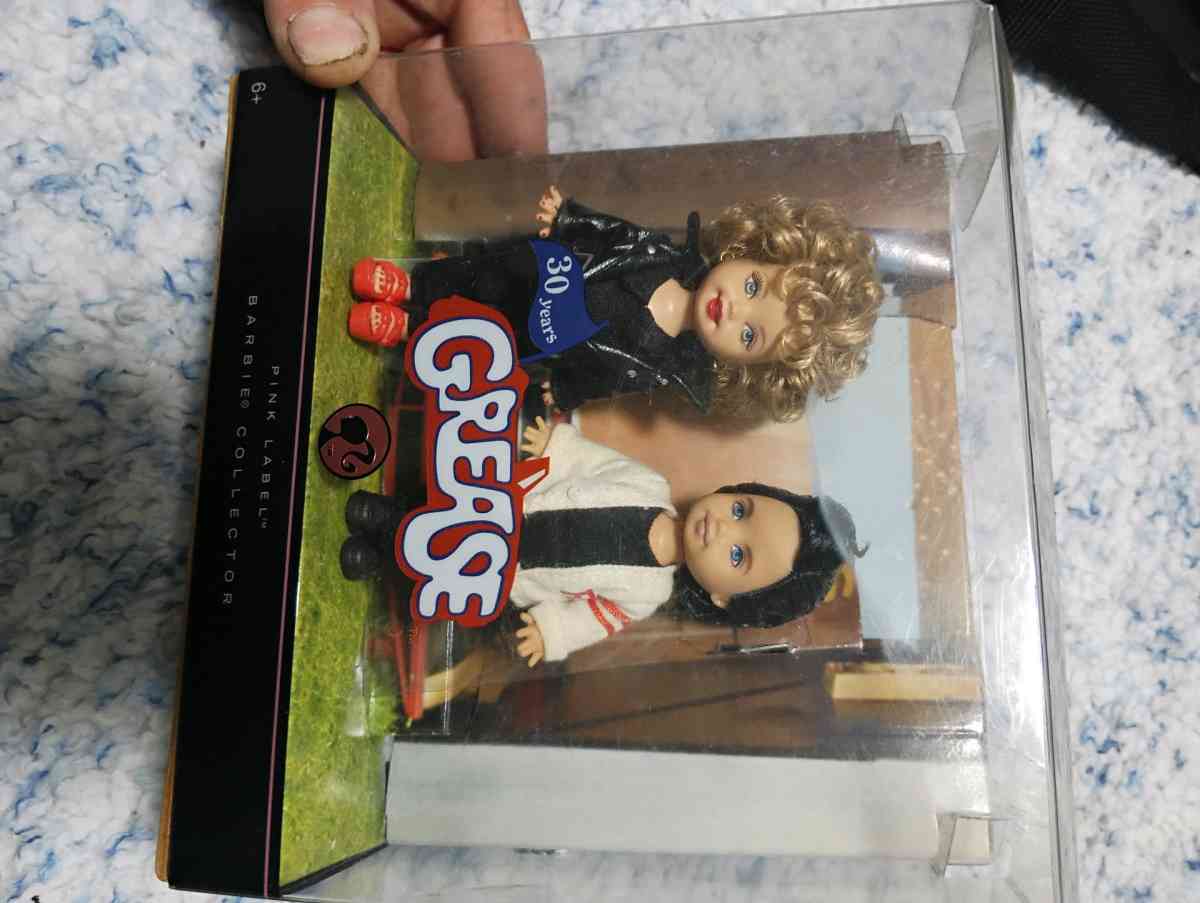 30 year of the movie Grease featuring Sandy and Danny dolls