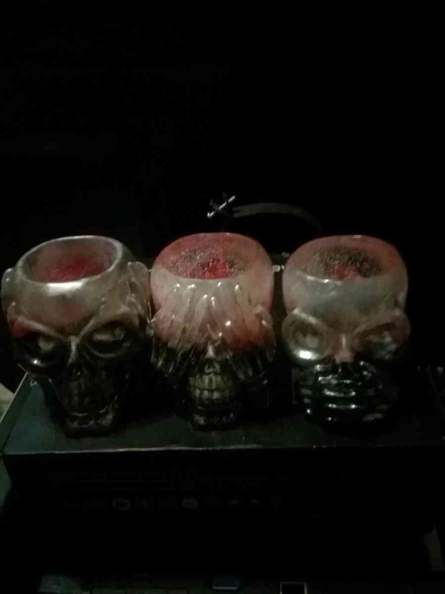 4 different sets of hear see or speak evil candle holders
