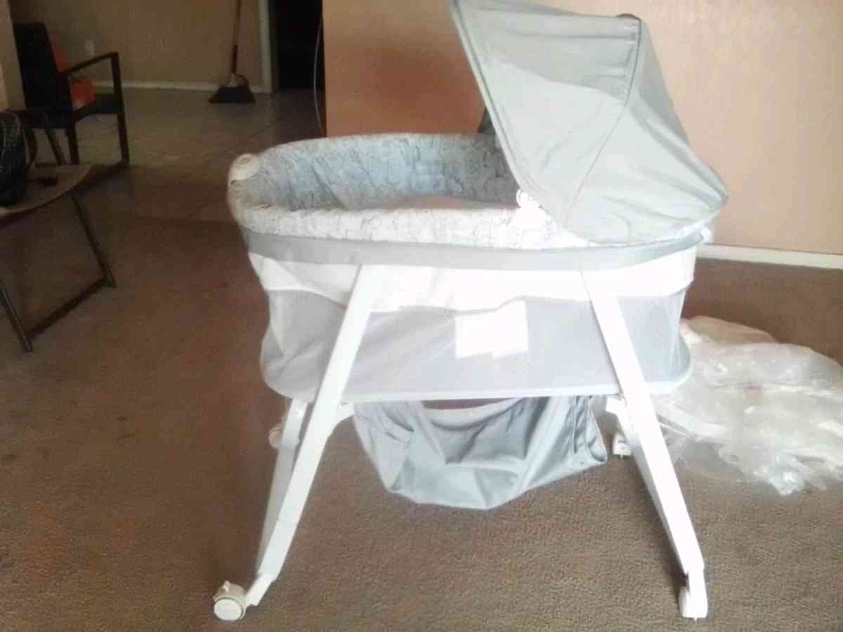 NEW BASSINET AND NEW INFANT CAR SEAT