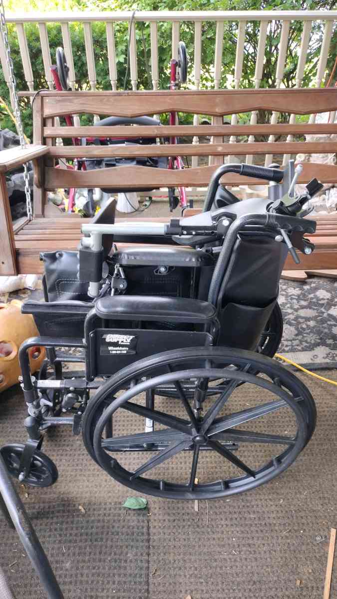 a brand new wheelchair never used that has the foot rest