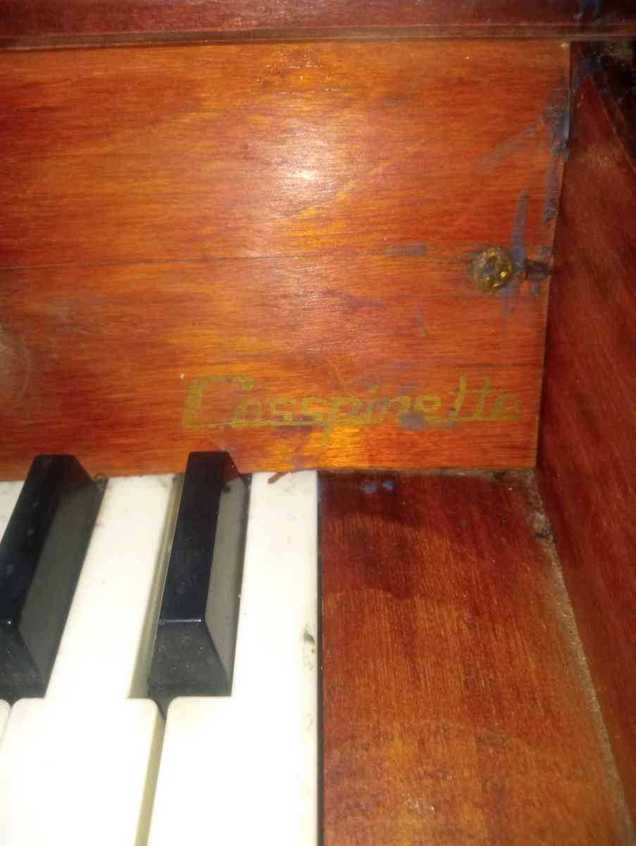 small antique vintage piano