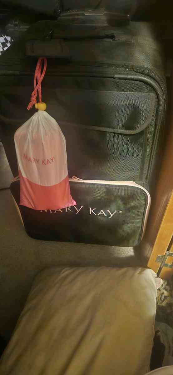 mary traveling suitcase filled with products