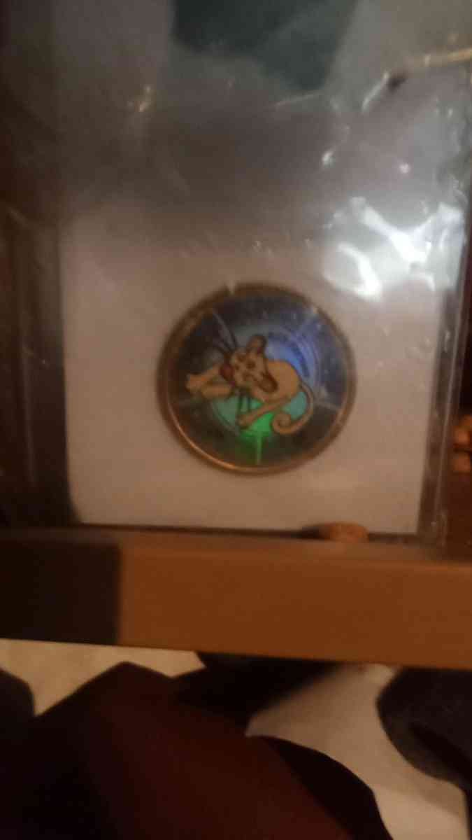 number 53 Pokemon collector coin Persian Dark vador